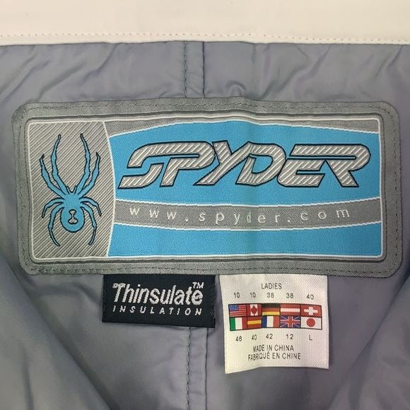 Spyder white with brown trim snow pants