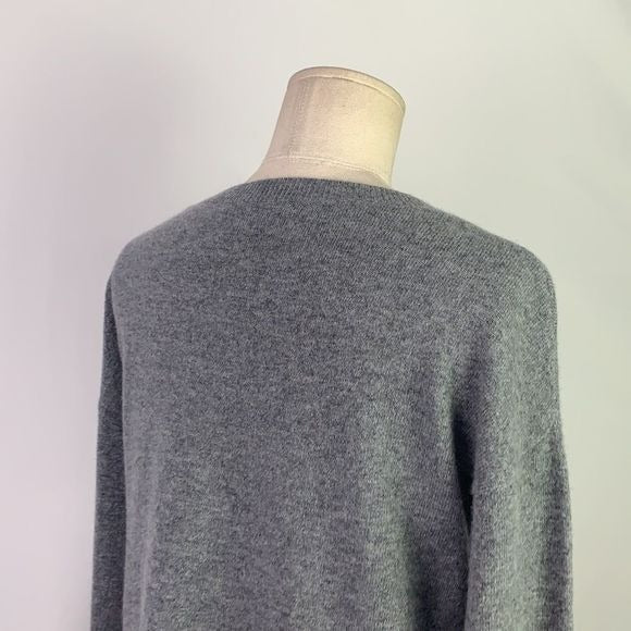 Gray cashmere sweater with fur trim cuffs