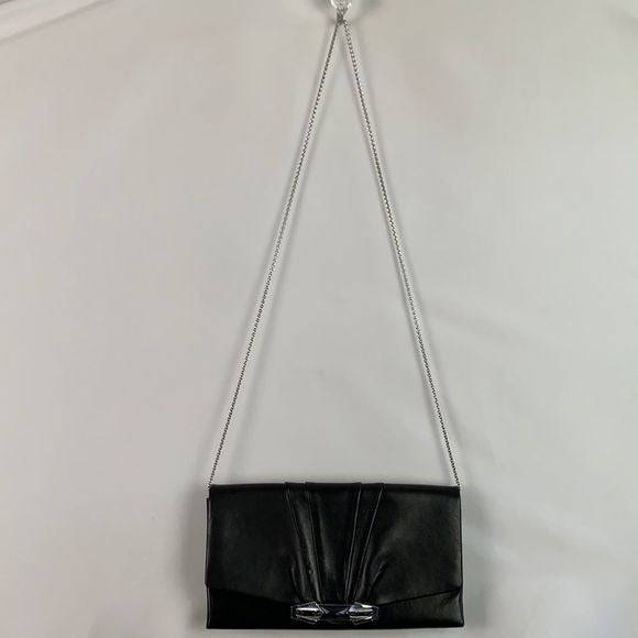 Judith Leiber black clutch with art decoration clasp